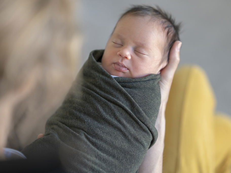 Ein Baby, das gepuckt wurde.